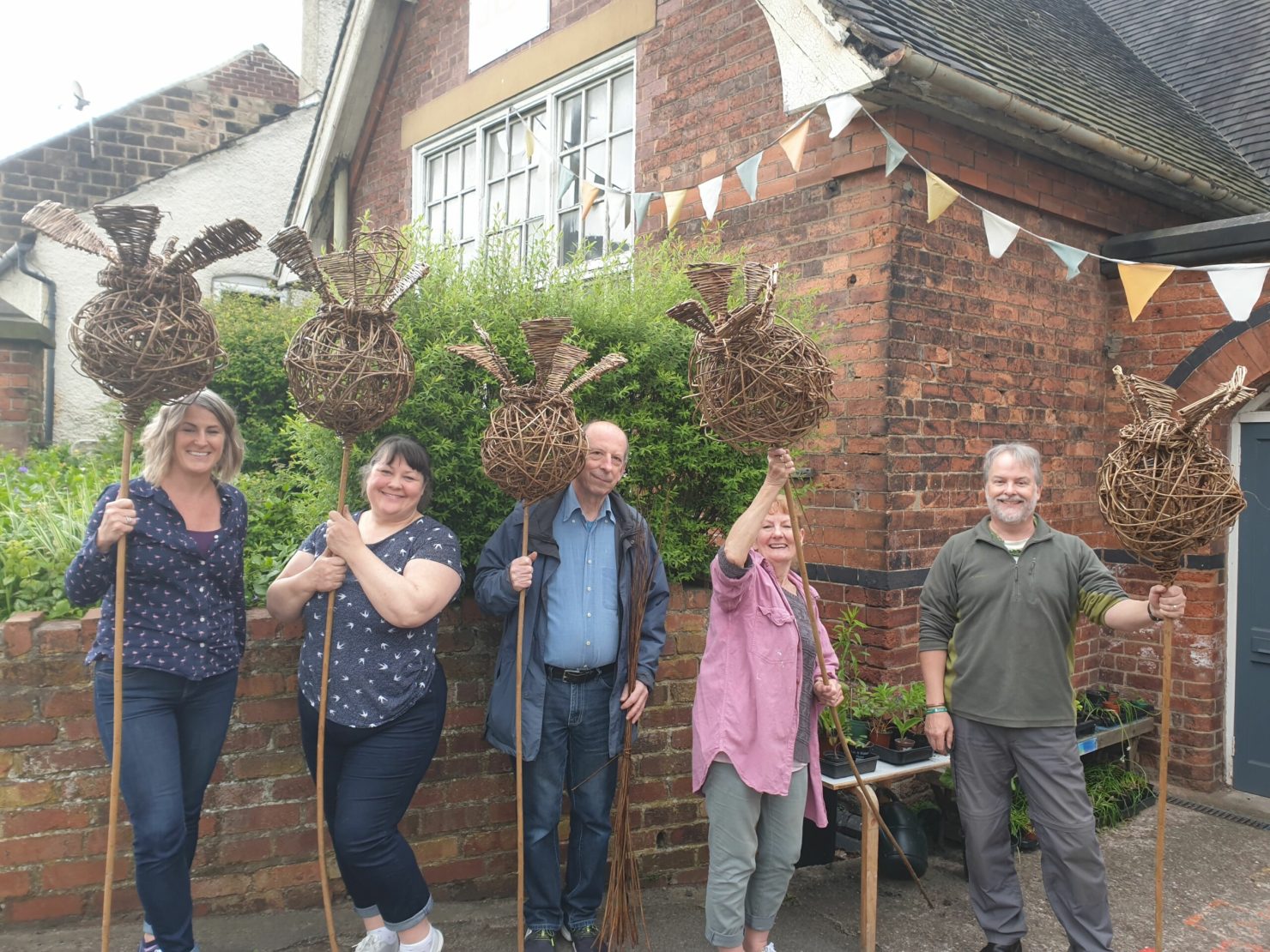 Willow sculpture giant poppy seed heads The Basketmakers' Association